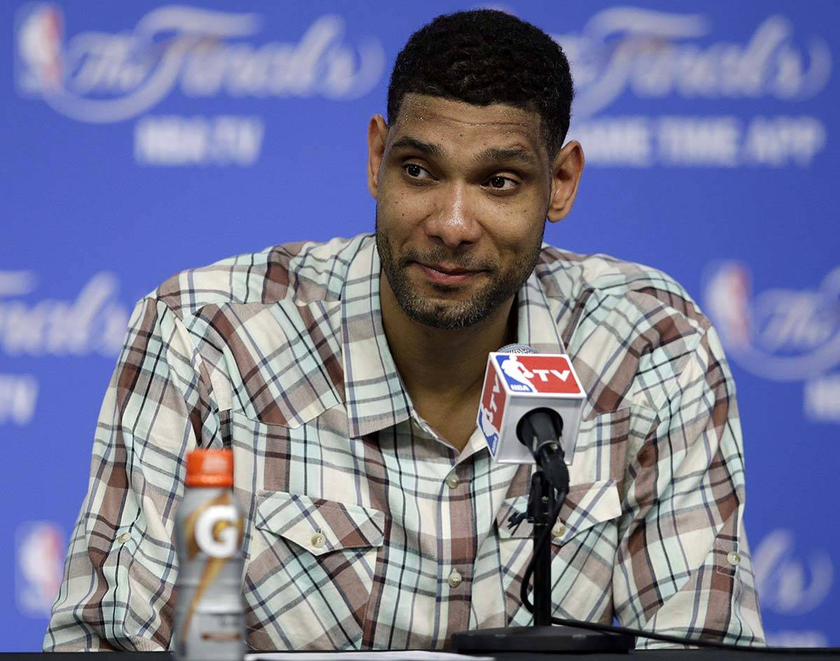 In this June 5, 2014 file photo, San Antonio Spurs forward Tim Duncan listens to a question dur ...