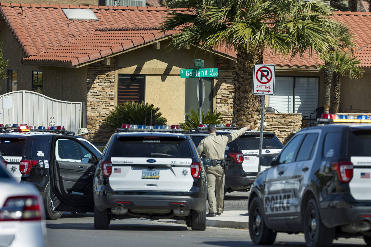 Las Vegas police on the scene of a reported homicide on the 4300 block of Garland Court on Satu ...