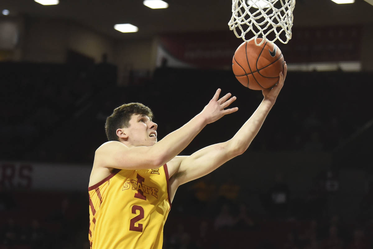 Iowa State guard Caleb Grill goes up for a shot during the first half of the team's NCAA colleg ...