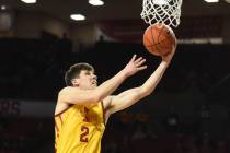 Iowa State guard Caleb Grill goes up for a shot during the first half of the team's NCAA colleg ...