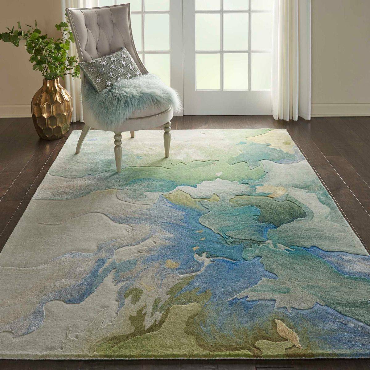 This Prismatic rug from Nourison features a 3D-like design and captivating floral color palette ...
