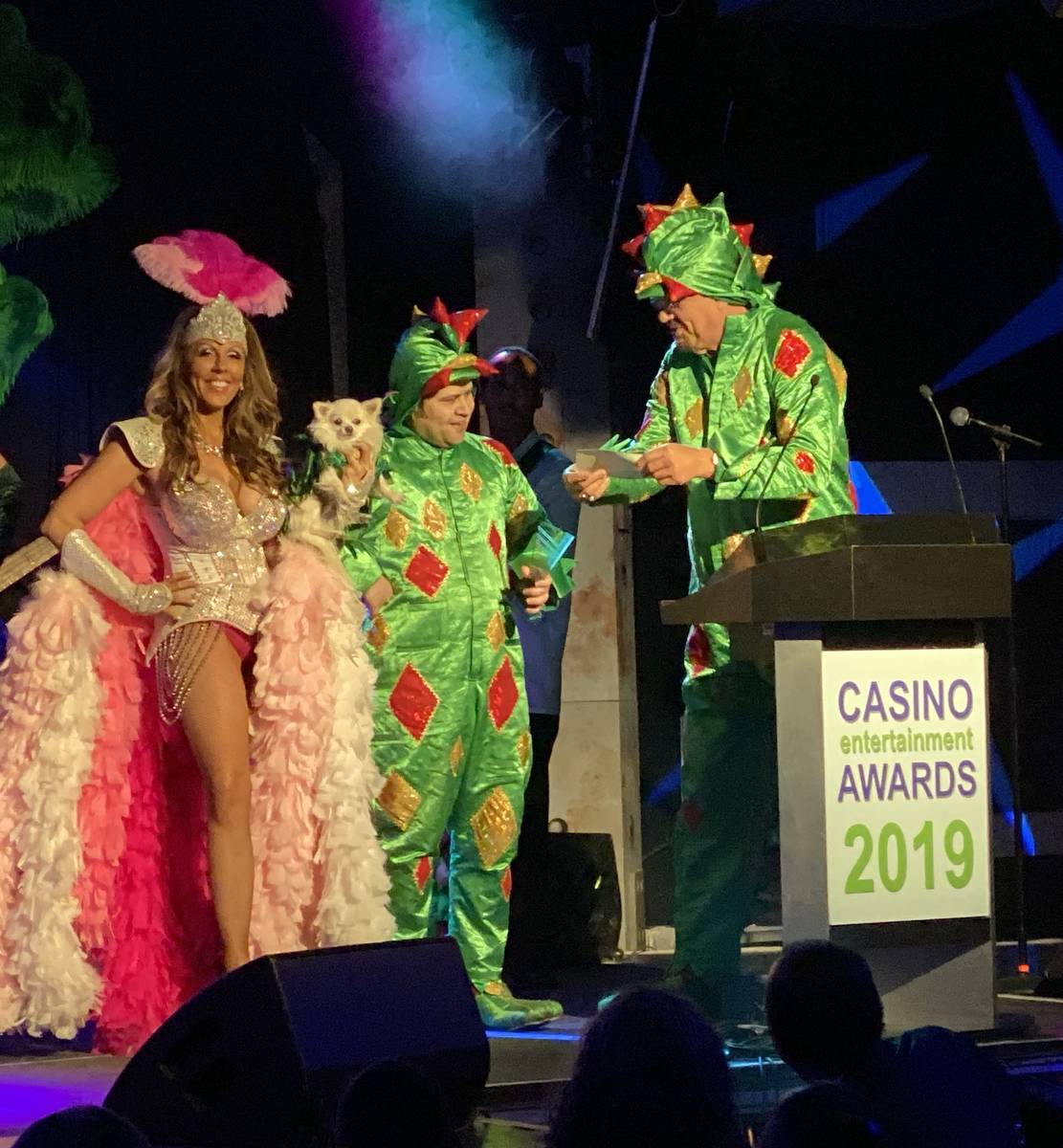 Jade Simone, Piff the Magic Dragon and Penn Jillette are shown as Piff accepts his Casino Comed ...