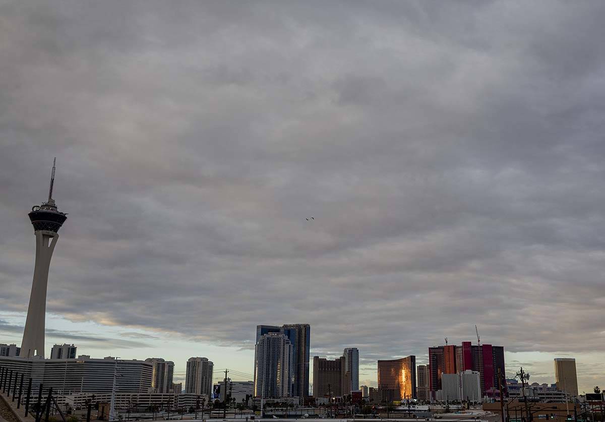 The sun peeks through gray clouds in Las Vegas on Tuesday, April 7, 2020. Rain is expected in t ...