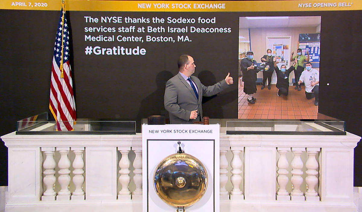 Tommy Gannon, assistant supervisor, Facilities, rings the opening bell at the New York Stock Ex ...