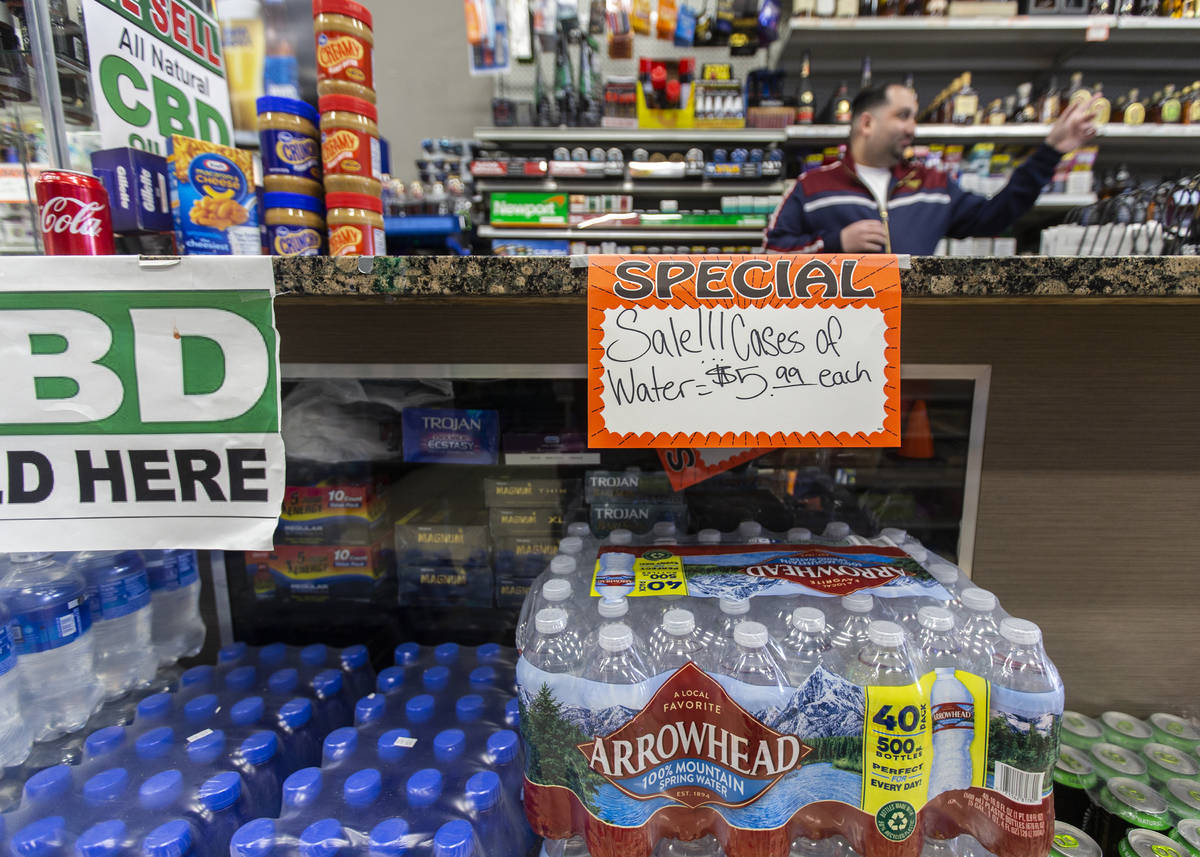 Cases of water at Liquor Emporium on Tuesday, April 7, 2020, in Las Vegas. The business just re ...