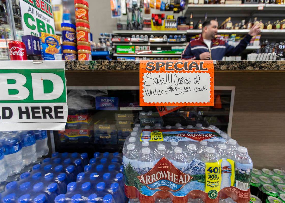Cases of water at Liquor Emporium on Tuesday, April 7, 2020, in Las Vegas. The business just re ...