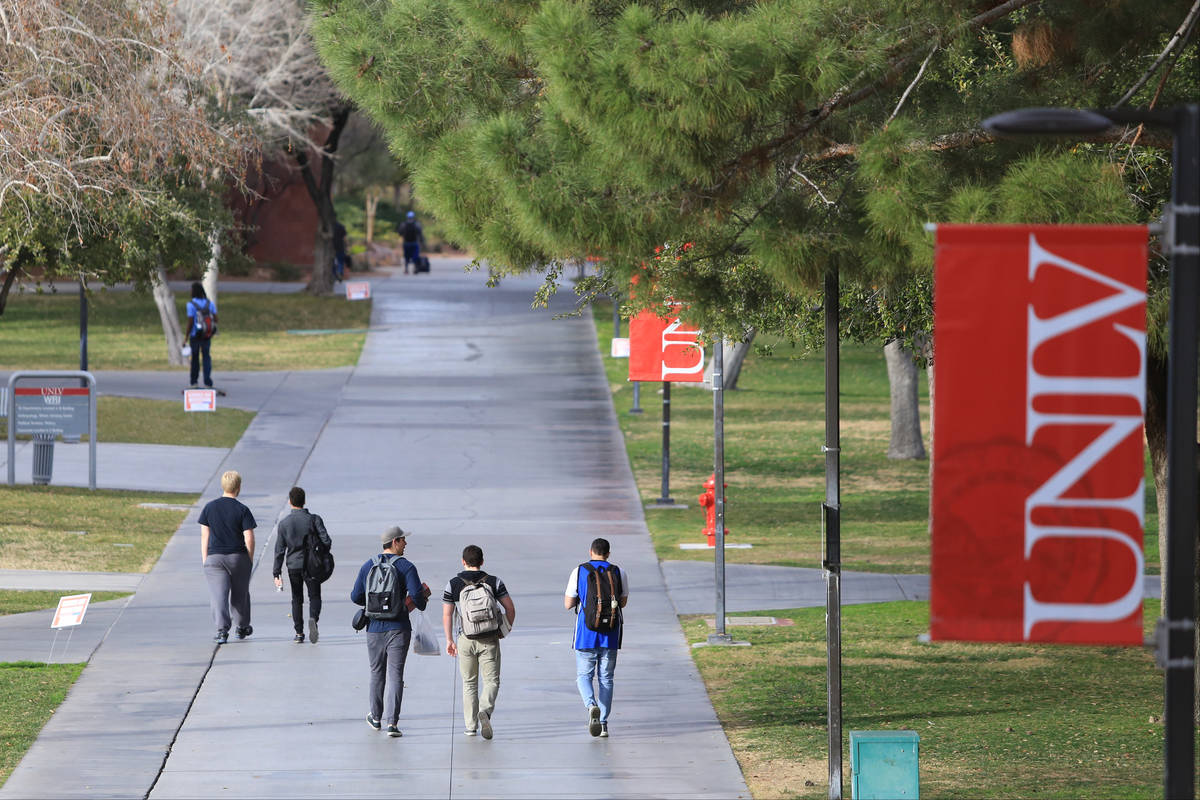Students walk along a sidewalk at UNLV on Thursday, Feb. 9, 2017, in Las Vegas. (Review-Journal ...