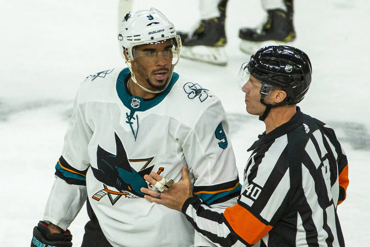 San Jose Sharks left wing Evander Kane (9) argues with a referee after fighting with Vegas Gold ...