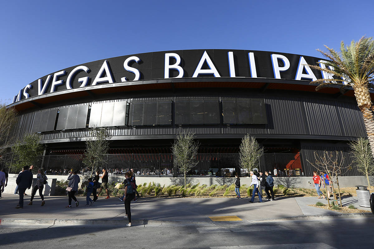 Fans line up to enter the Las Vegas Ballpark for the Las Vegas Aviators' home opener in Downtow ...