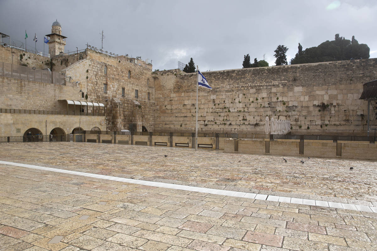 The Western Wall, the holiest site where Jews can pray, in Jerusalem's Old City, is empty Frida ...