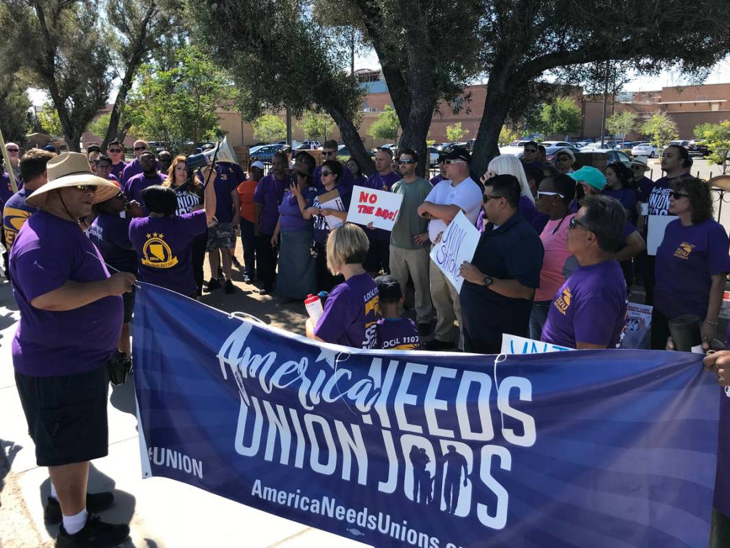 Members of the Service Employees International Union picket outside the Las Vegas Review-Journa ...