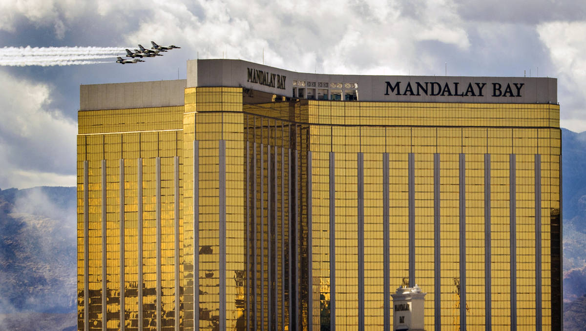 The U.S. Air Force Air Demonstration Squadron ÒThunderbirdsÓ soar by the Mandalay Bay ...