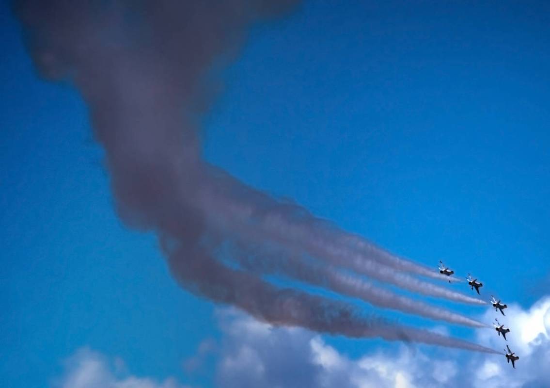 Six F-16 Fighting Falcons with the U.S. Air Force Air Demonstration Squadron Thunderbirds fly o ...