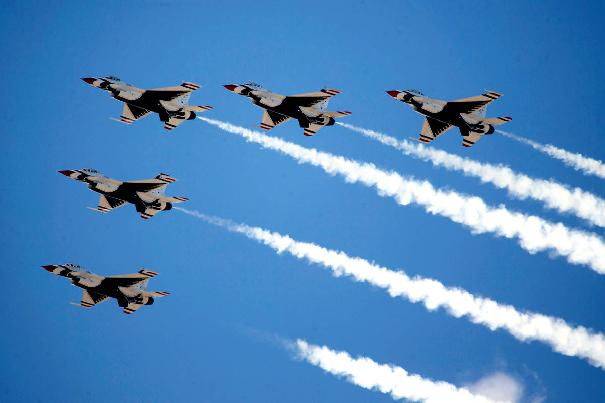 The U.S. Air Force Air Demonstration Squadron “Thunderbirds” do a flyover Summerl ...