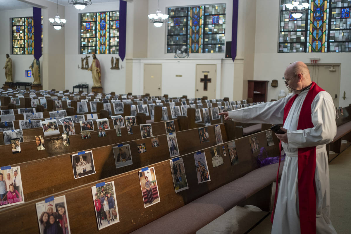 The Rev. Nicolas Sanchez points while talking about the diversity of families who sent their pi ...