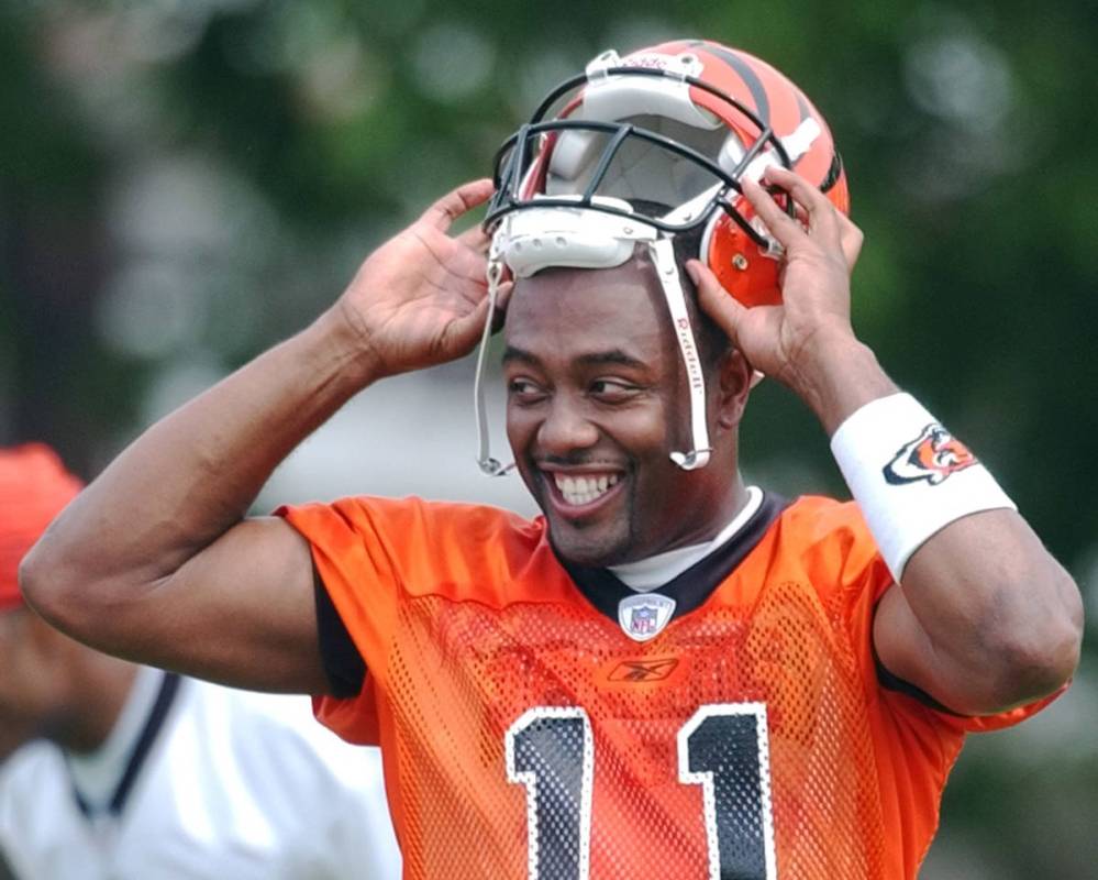 Cincinnati Bengals quarterback Akili Smith smiles during practice, Friday, July 26, 2002, at t ...