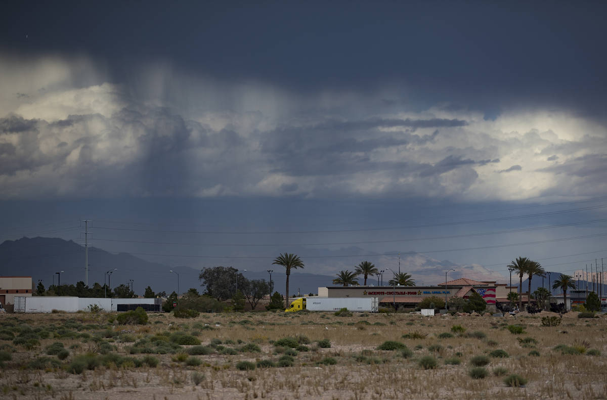 Rain and clouds seen from the southwest part of the valley in Las Vegas, Sunday, April 12, 2020 ...