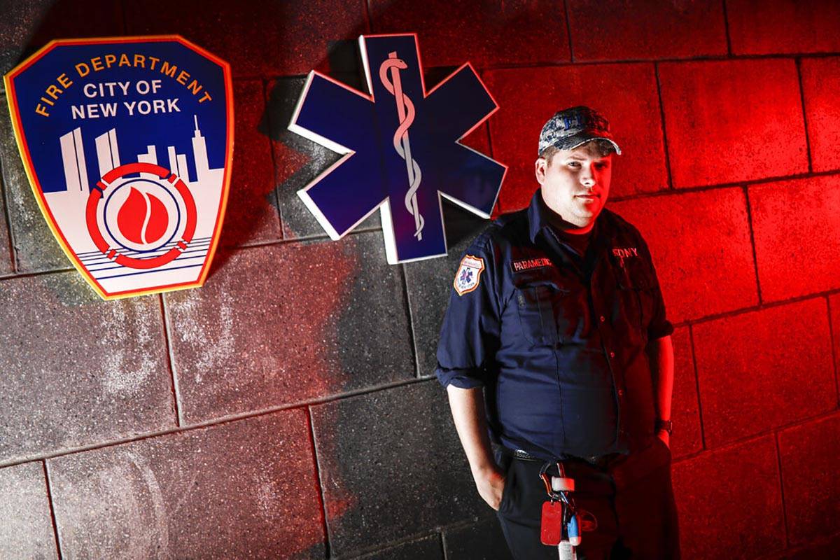 Paramedic Travis Kessel is photographed outside his station house after working a shift amid th ...