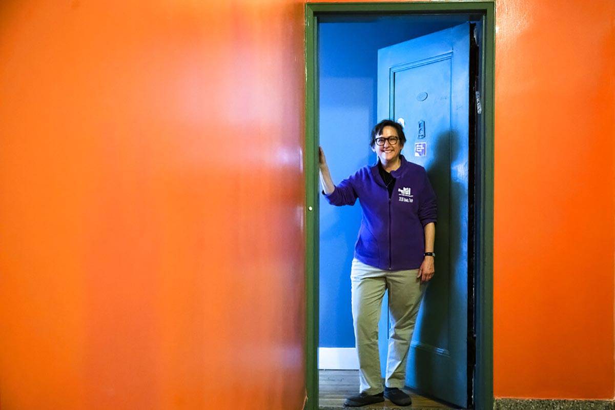 Rabbi Sharon Kleinbaum poses for a photograph at the door to her apartment in New York, Monday, ...