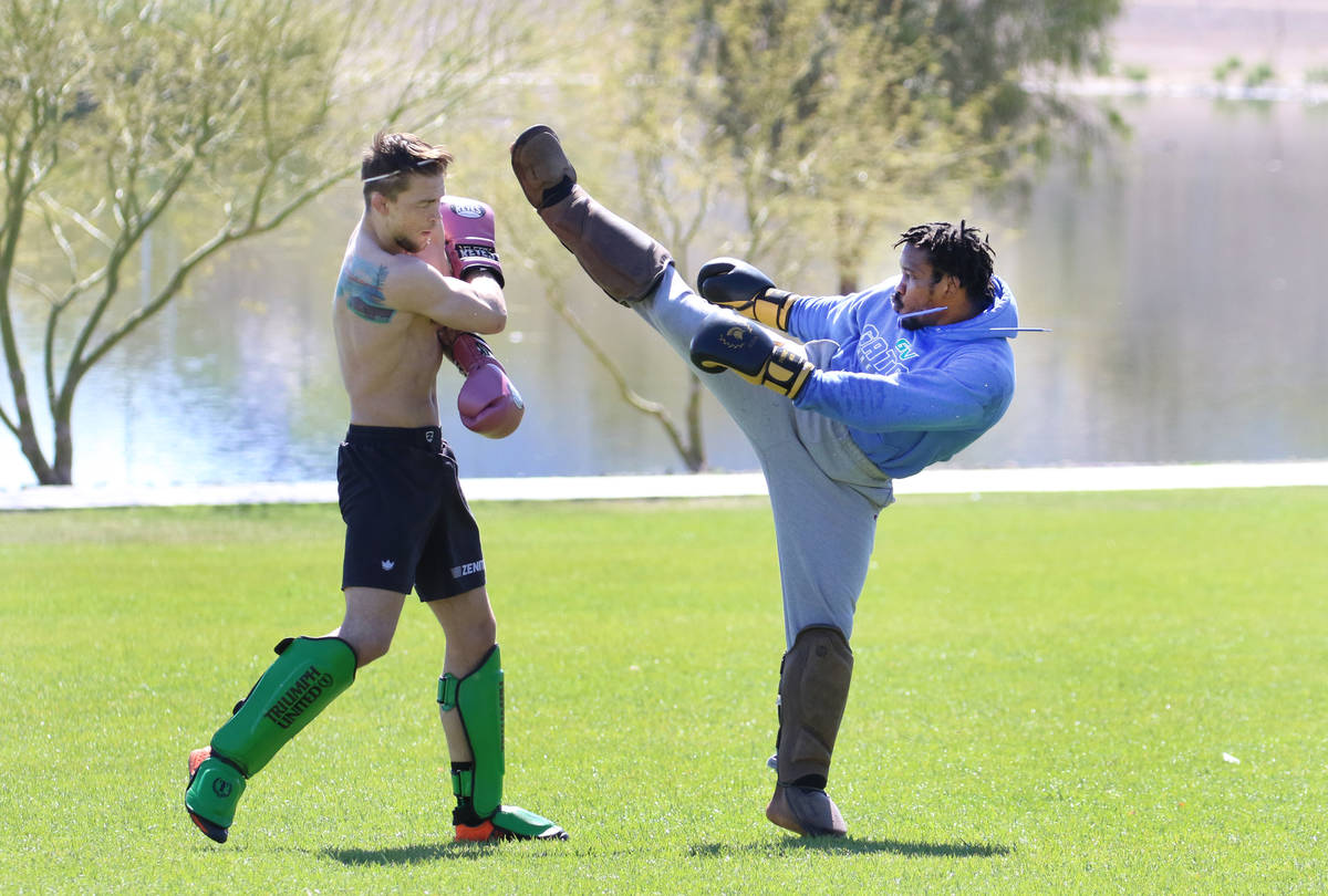 Max Rohskopf, left, and Baba Badman Jerkins practice their mixed martial arts at Cornerstone Pa ...