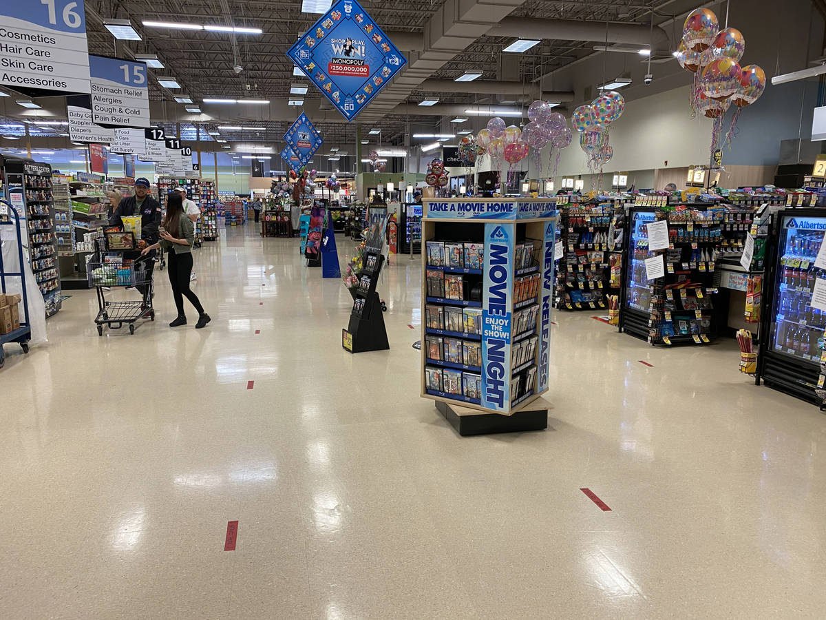 Floor marking to keep shoppers six feet apart at Albertsons at 1650 N. Buffalo Dr. in Las Vegas ...