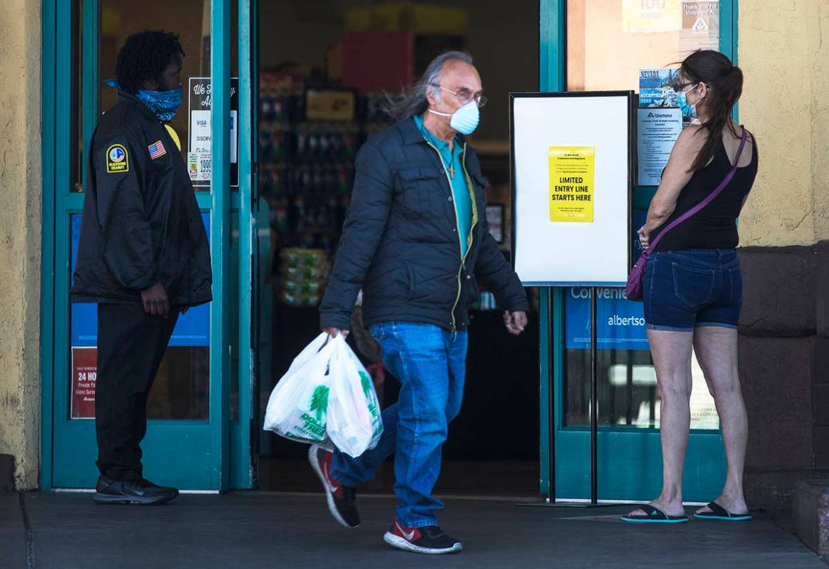 Customers coming and going from the Albertsons on Charleston in Las Vegas, Monday, April 13, 20 ...