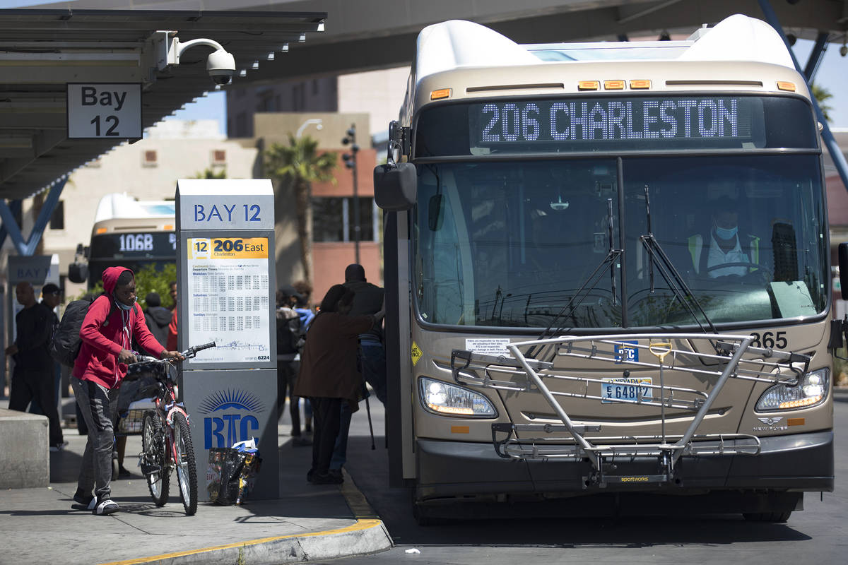 Passengers got off and on the bus at the Bonneville Transit Center in Las Vegas, Tuesday, April ...