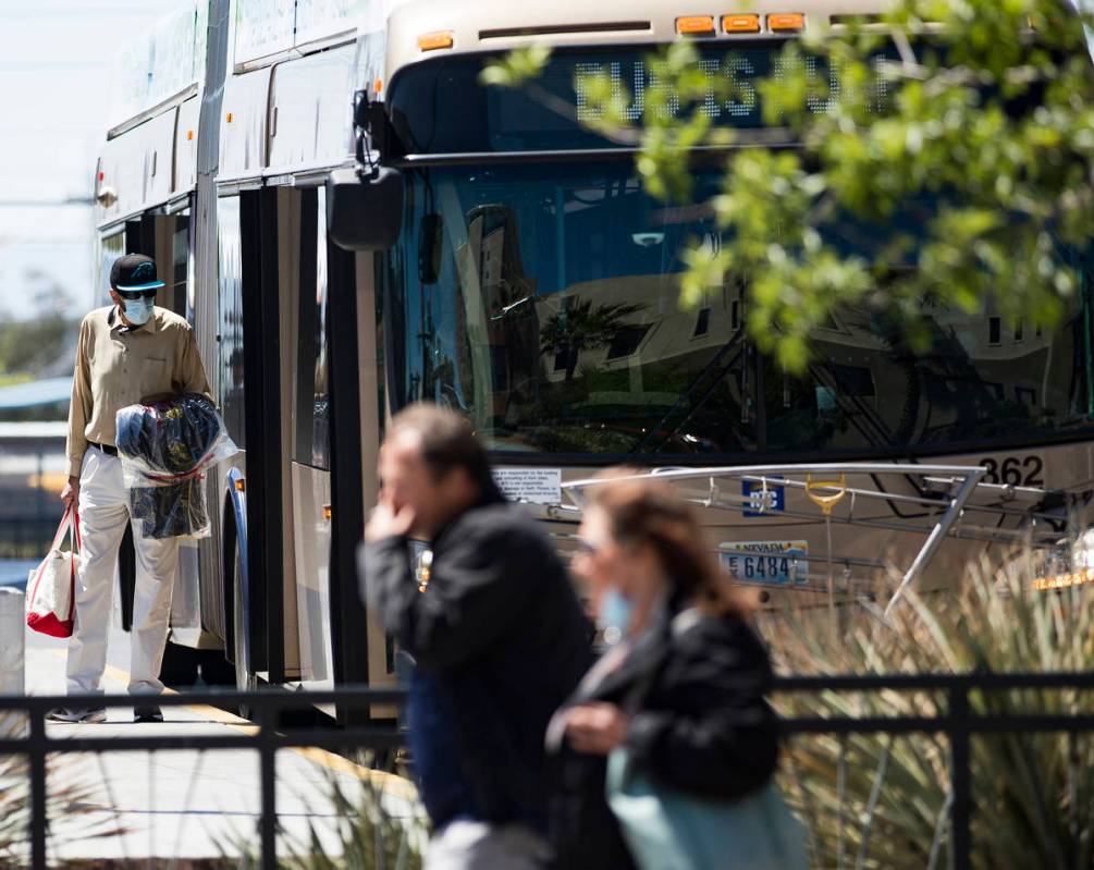 Passengers got off and on the bus at the Bonneville Transit Center in Las Vegas, Tuesday, April ...