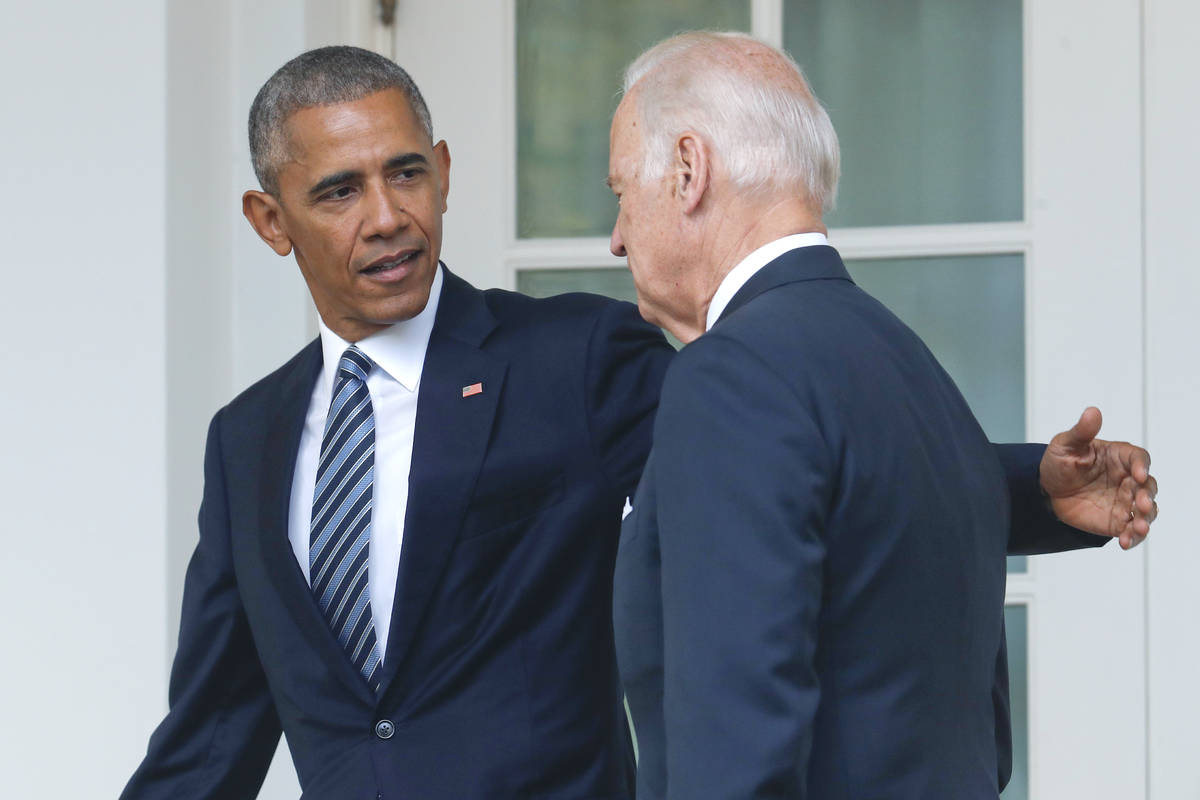 FILE - In this Nov. 9, 2016 file photo, President Barack Obama, accompanied by Vice President J ...