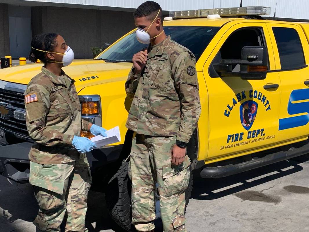 Soldiers with the 1-221 Cavalry process shipments of medical supplies in response to COVID-19, ...