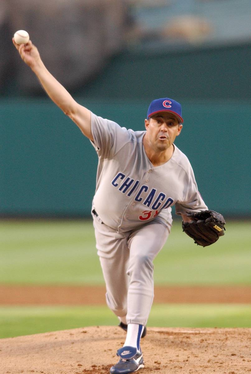 Chicago Cubs pitcher Greg Maddux throws against the Anaheim Angels in the first inning Friday, ...