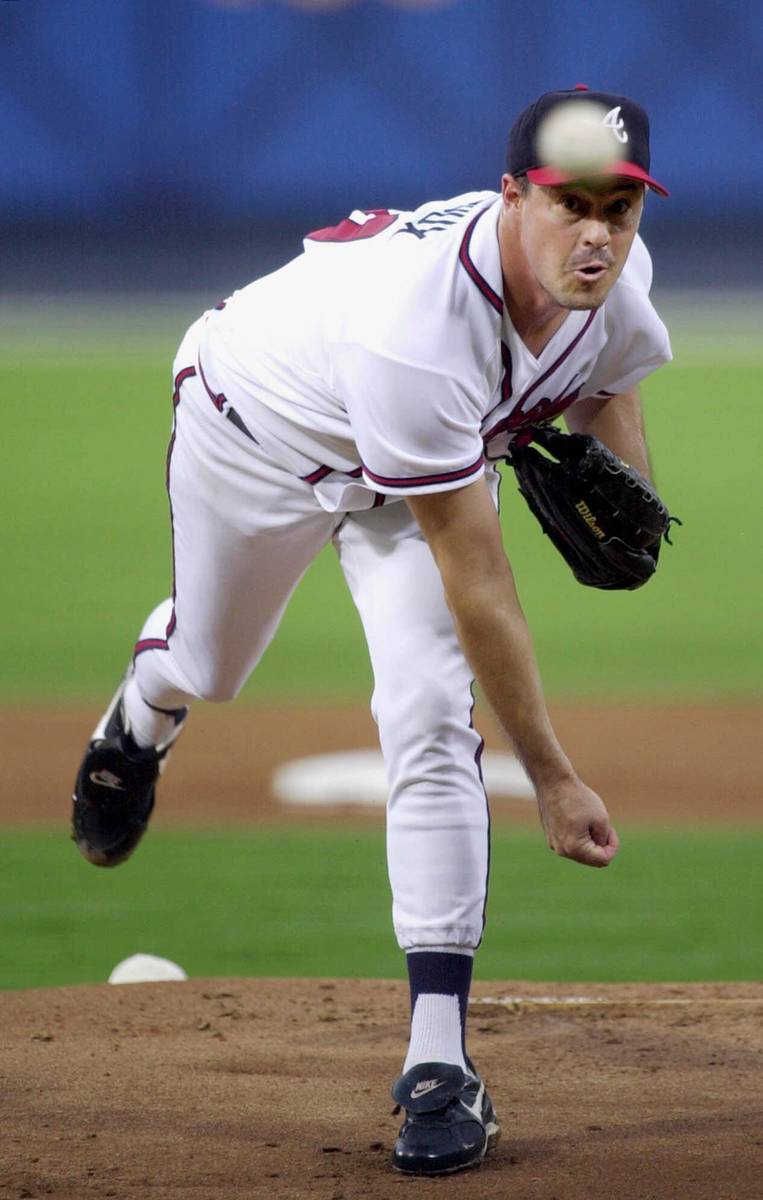 Atlanta Braves starting pitcher Greg Maddux throws to a Houston Astros batter in the first inni ...