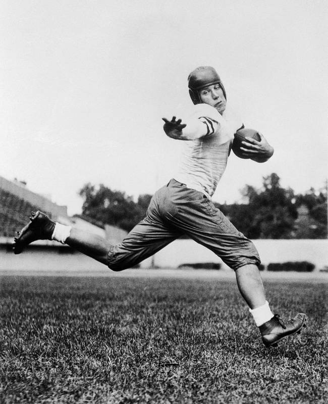 University of Chicago halfback Jay Berwanger is shown in 1934 in the action pose that served as ...