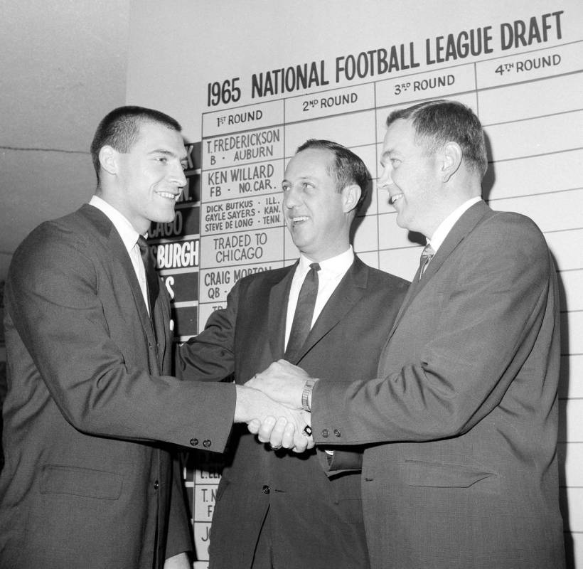 Tom Nowatzke, left, a fullback from the University of Indiana, is shown with NFL commissioner P ...