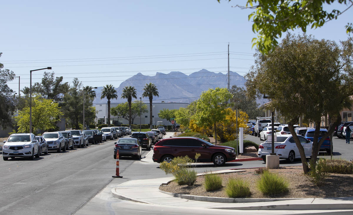 Cars line up for drive-through COVID-19 antibody testing outside PAM Speciality Hospital on Tue ...