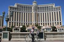 Catherine Garner and her son Jack, 4, are seen in front of the Bellagio Fountain during a sunn ...