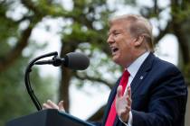 President Donald Trump speaks about the coronavirus in the Rose Garden of the White House, Tues ...