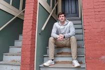 Cameron Karosis, 27, a software salesman, poses for a portrait outside his home, Tuesday, April ...