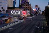 The Las Vegas Strip is deserted as casinos and other business are closed because of the coronav ...