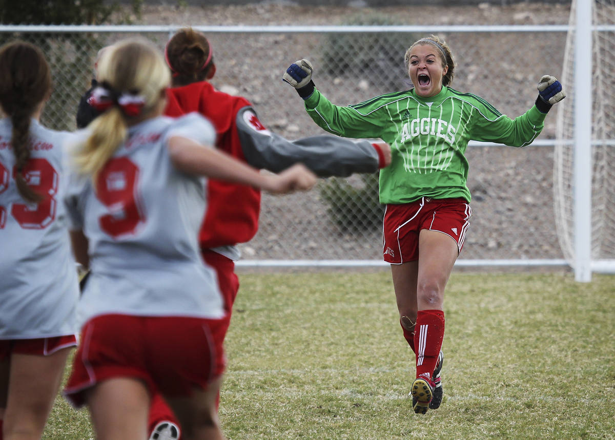 Arbor View goalie Hayley Fife, right, runs towards her teammates after making the crucial save ...