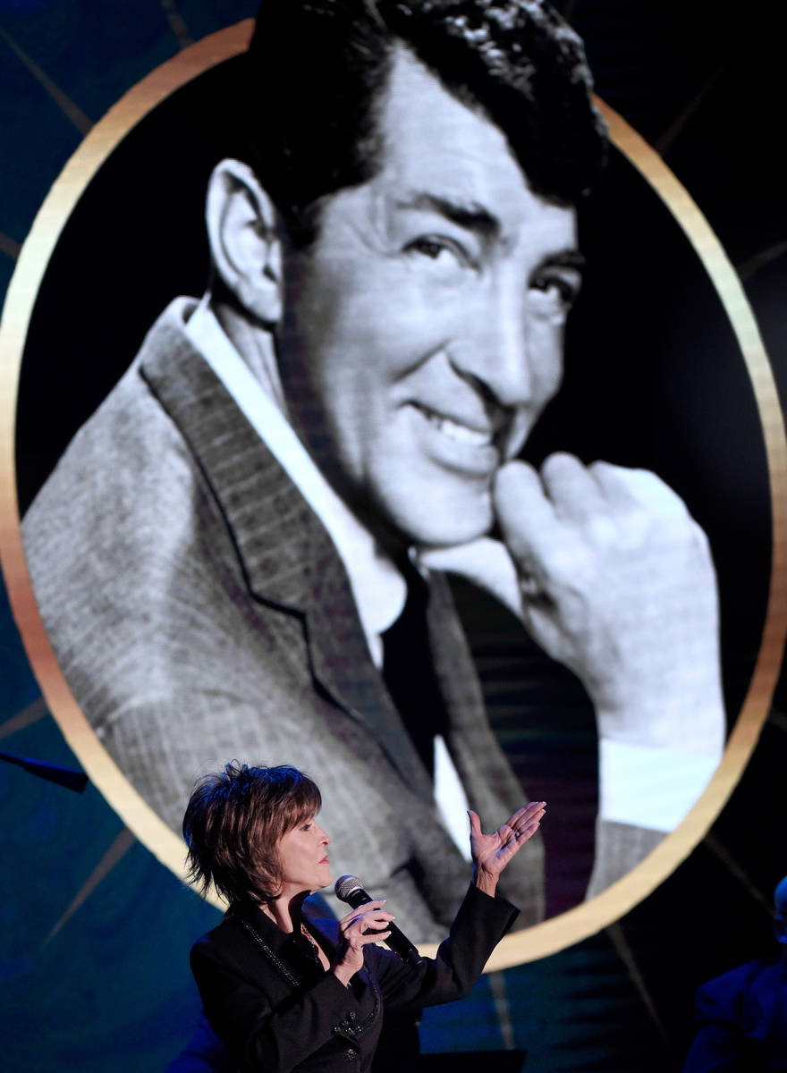 A portrait of her father, Dean Martin, looms large during Deana Martin's 2017  "Deana Sings Di ...