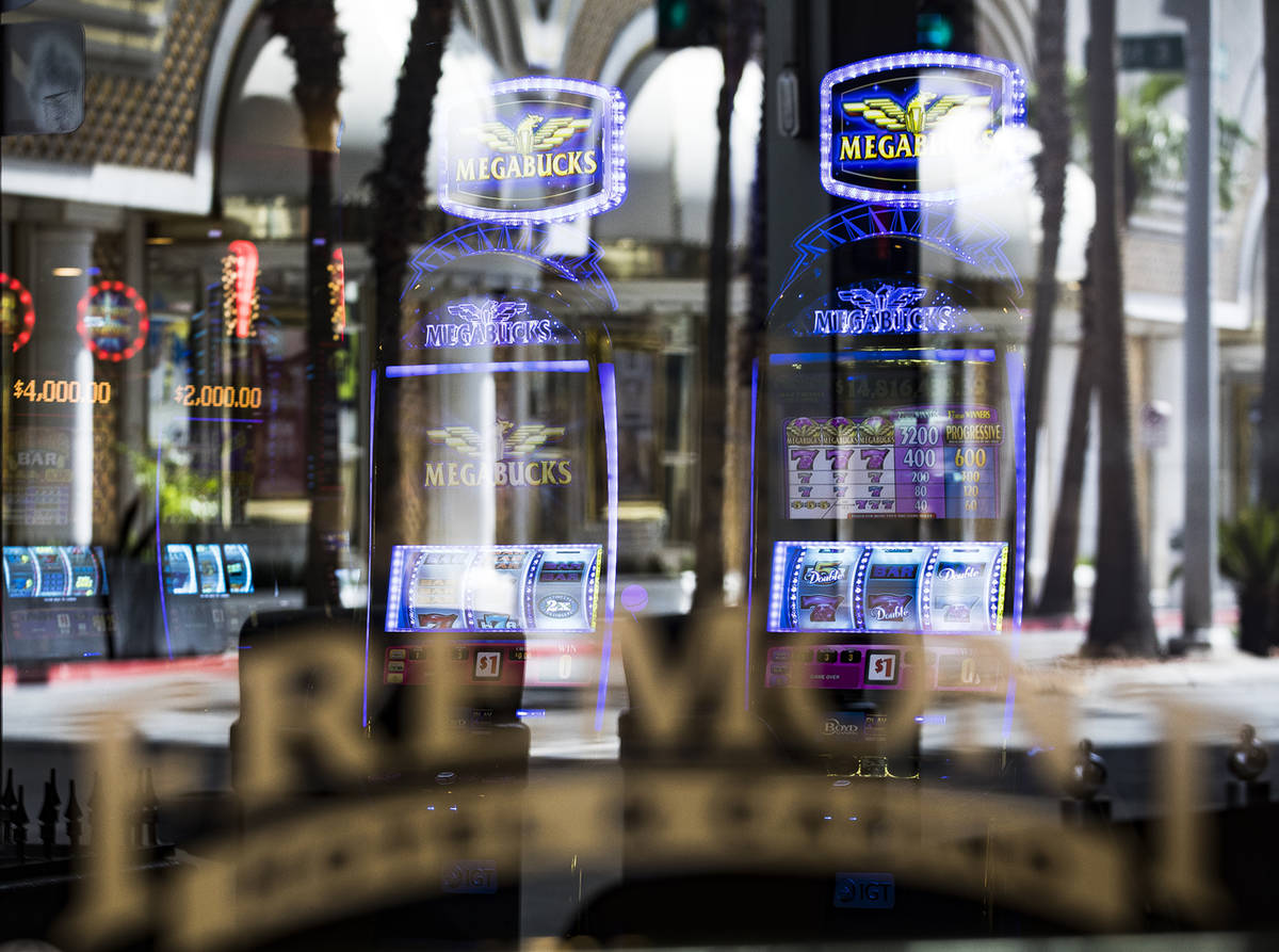 Empty slot machines on the Fremont casino floor in Las Vegas, Sunday, April 19, 2020. (Rachel A ...