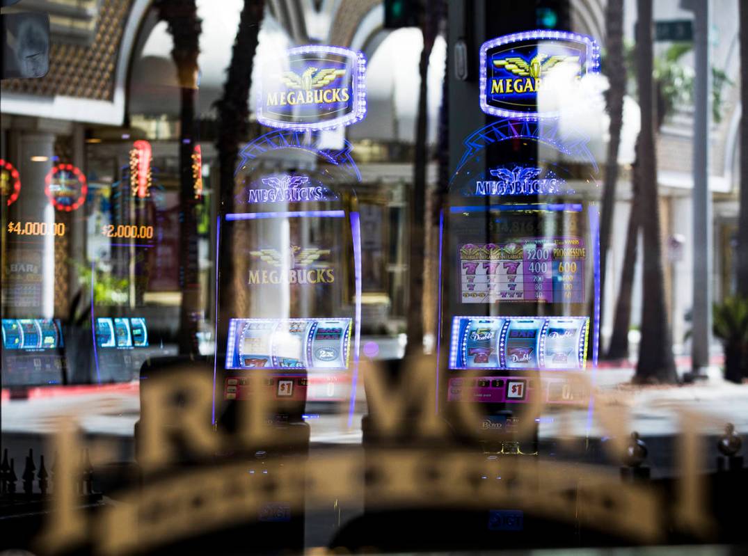Empty slot machines on the Fremont casino floor in Las Vegas, Sunday, April 19, 2020. (Rachel A ...