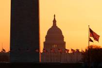 FILE - In this March 18, 2020, file photo, the Washington Monument and the U.S. Capitol are see ...