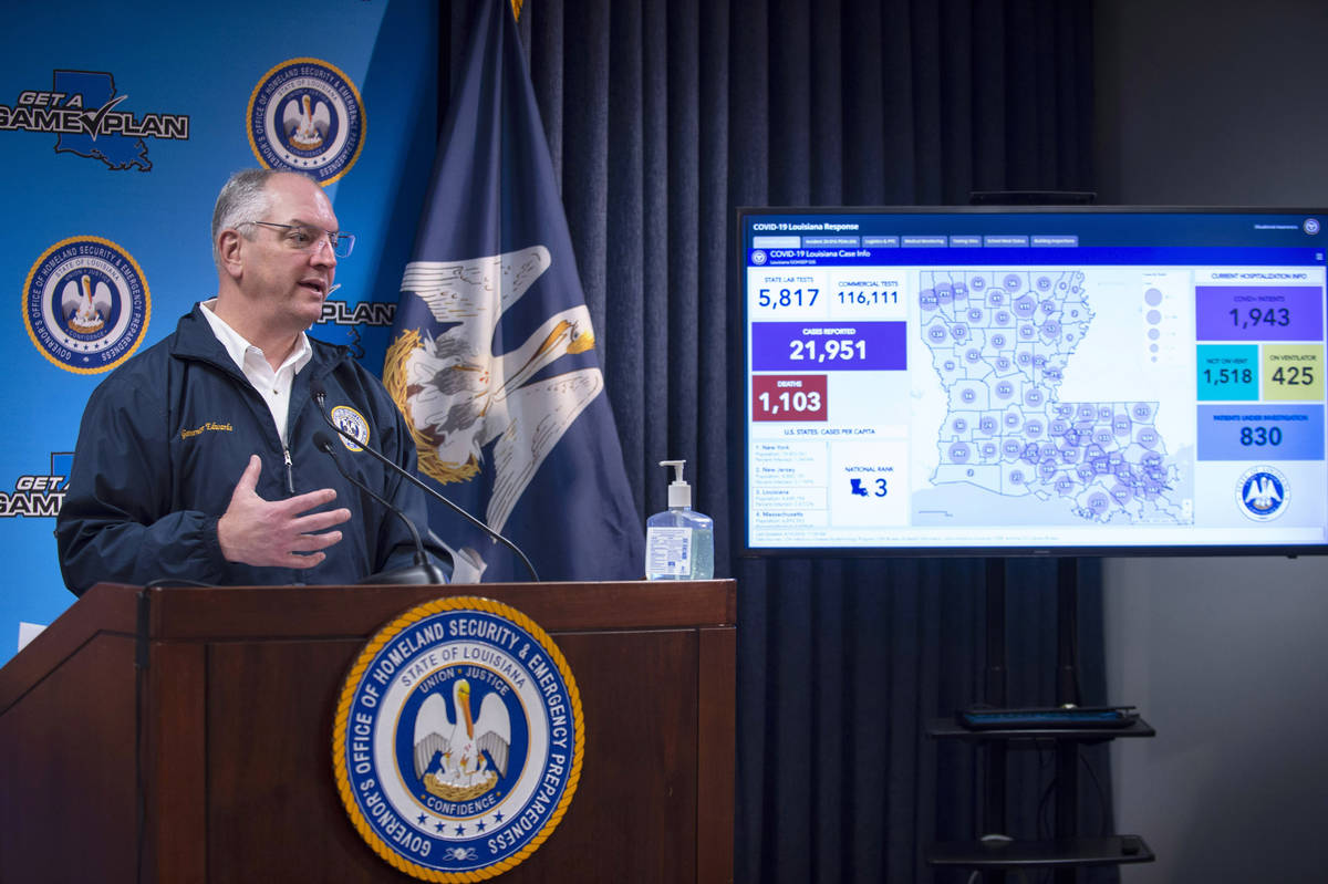 Louisiana Gov. John Bel Edwards speaks at his briefing of media members on the state's current ...