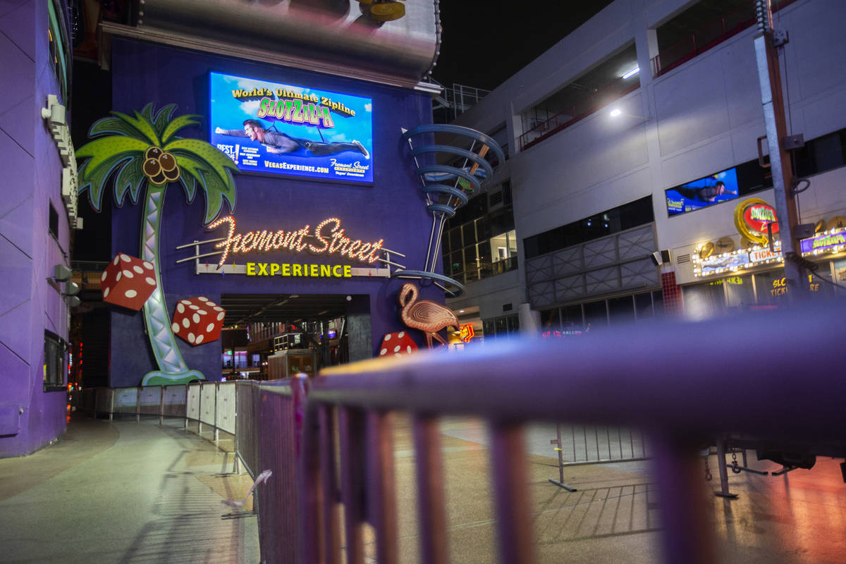 Gates block the entrance to the Fremont Street Experience in downtown Las Vegas, which is close ...