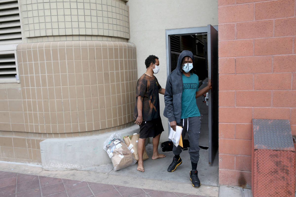 Micah "Aqua" Peoples, 35, left, and Terry Whitehead, 21, are released from the Clark County Det ...