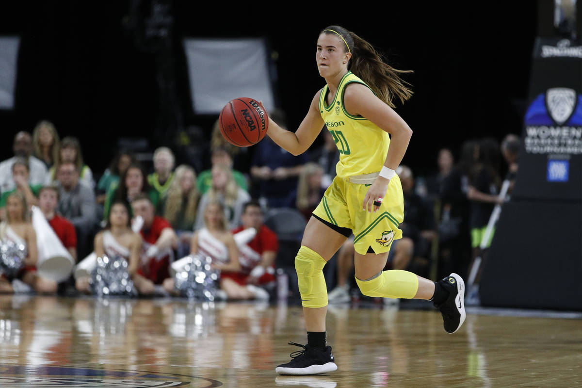FILE - In this March 6, 2020, file photo, Oregon's Sabrina Ionescu (20) plays against Utah in a ...