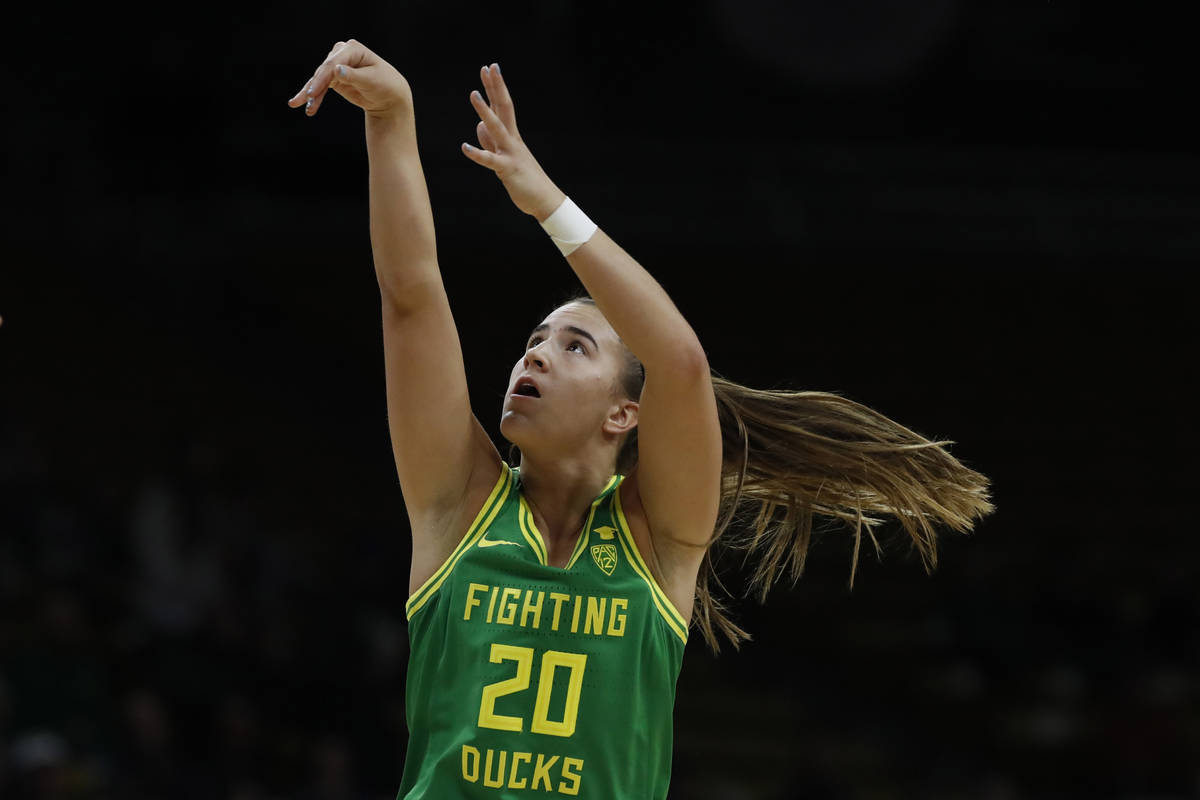 In this Feb. 1, 2020, file photo, Oregon guard Sabrina Ionescu (20) shoots in the first half of ...