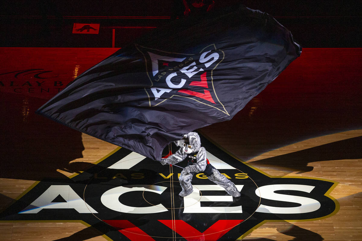 Buckets waves the flag as the Las Vegas Aces ready to face the Washington Mystics during the fi ...